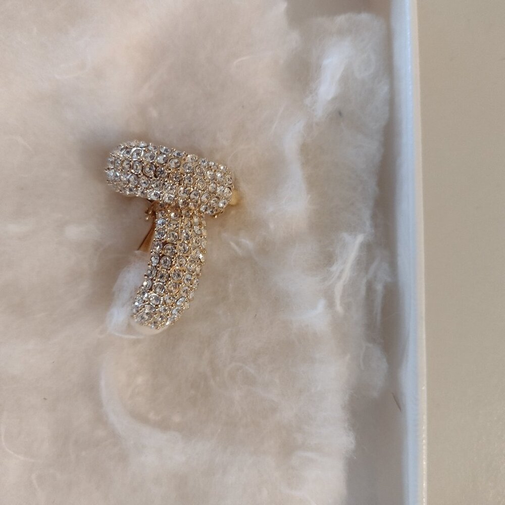 Vintage Caro gold tone clip on earrings with crystals.